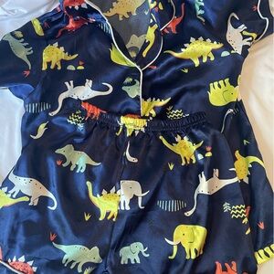 Dino PJs for boys/girls. Silky material.